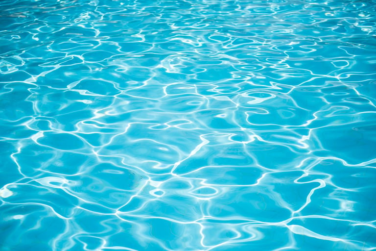 Pool pH balancers